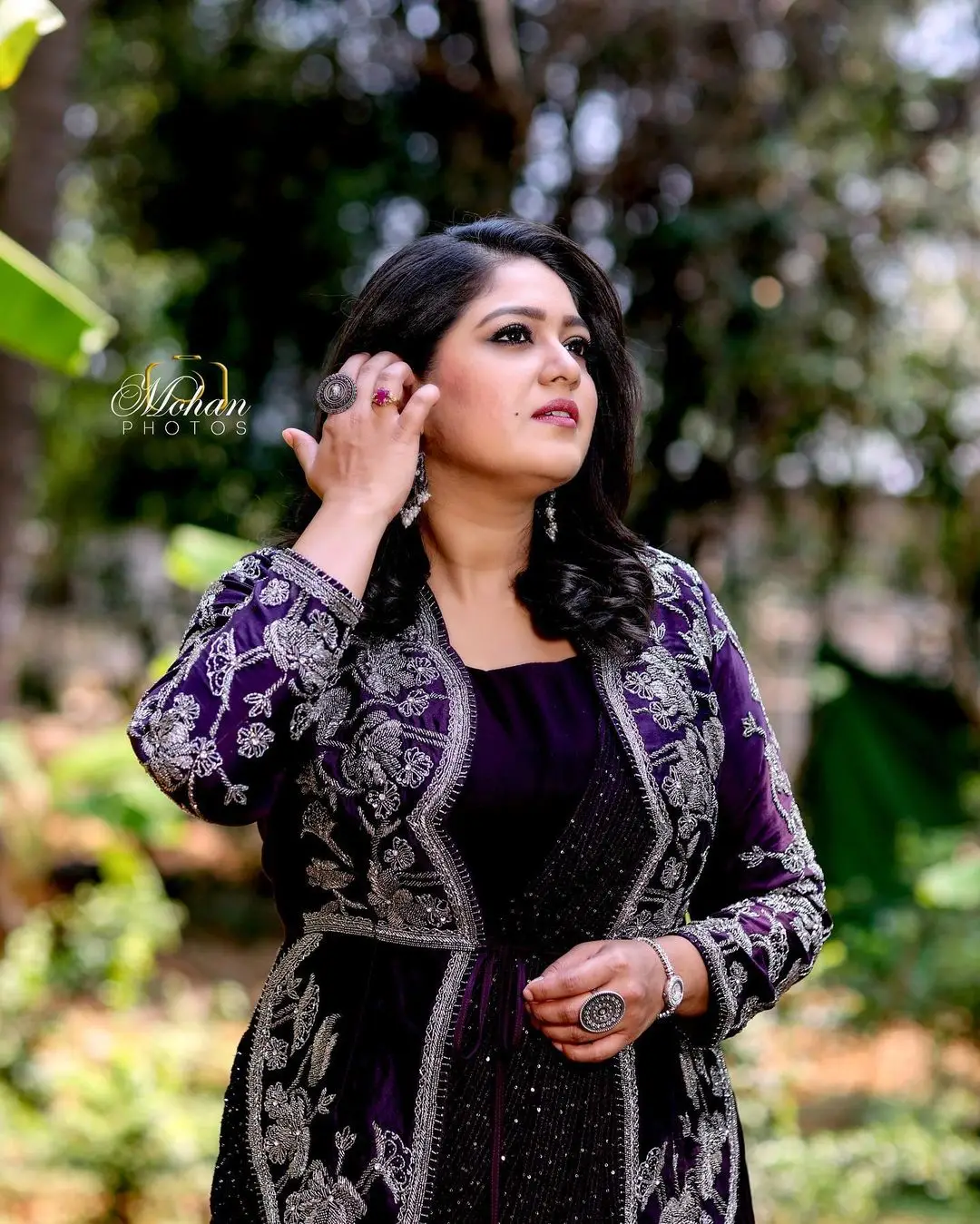 Meghana Raj Wearing Beautiful Earring Black Designer Gown